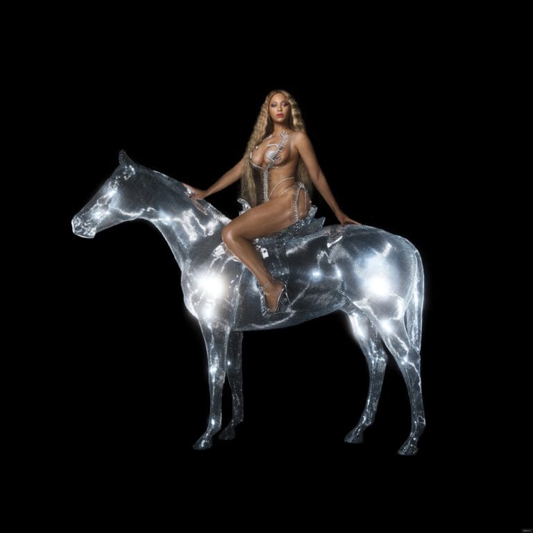 Beyoncé: Wears a daring metallic outfit that highlights her figure, mounted on a shiny horse…