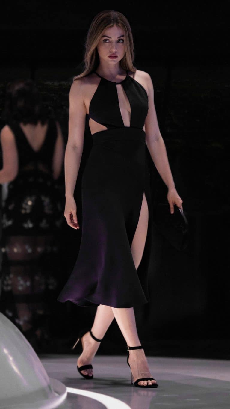 Ana de Armas: Wears an elegant black halter dress with cutouts. The footwear consists&hellip;