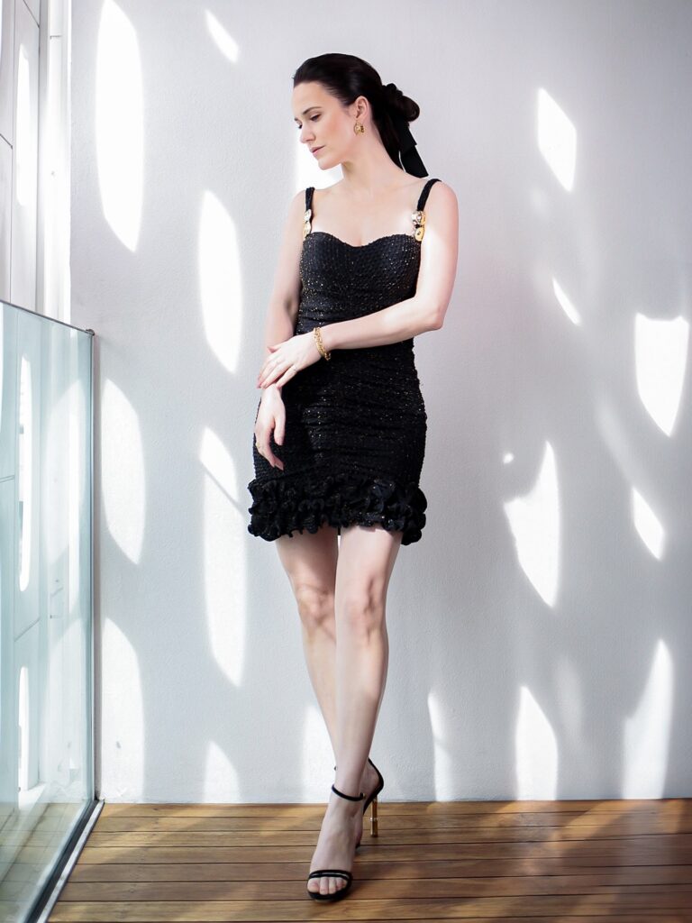Rachel Brosnahan: Wearing an elegant black dress with sparkly details and gold decorative straps. Completes her&hellip;