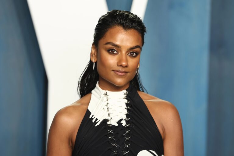 Simone Ashley: Wears an elegant black-and-white dress with crossed details at the…