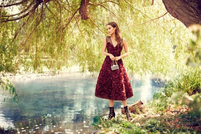 Alicia Vikander: Wearing a floral-textured dress in burgundy tones, paired with black sandals&hellip;