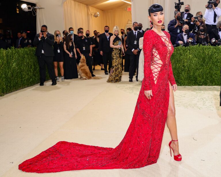 Megan Fox: Wears a long red dress with lace and sparkly details, which has…