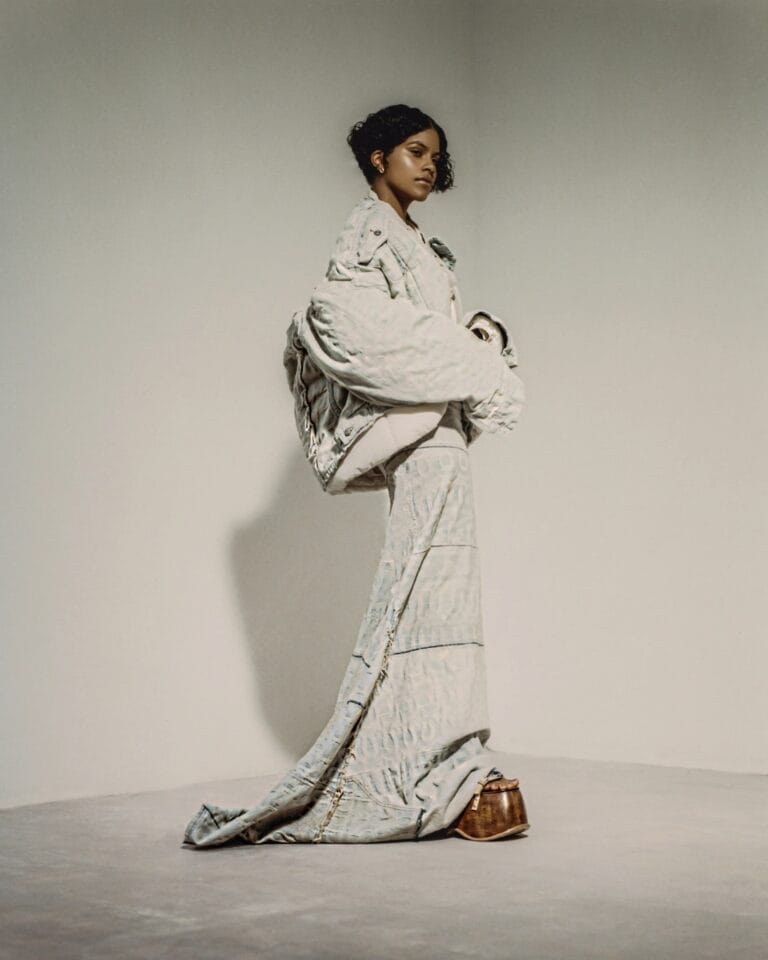 Zazie Beetz: Wears a voluminous light-colored jacket with subtle patterns and a long dress…