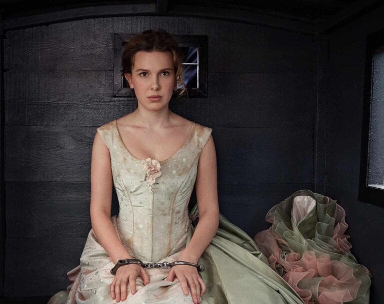 Millie Bobby Brown: Wears a light-colored vintage dress with a floral-embellished corset. The…