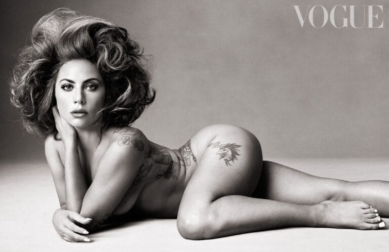 Lady Gaga: In a photo studio with a neutral backdrop, with voluminous hair styled...