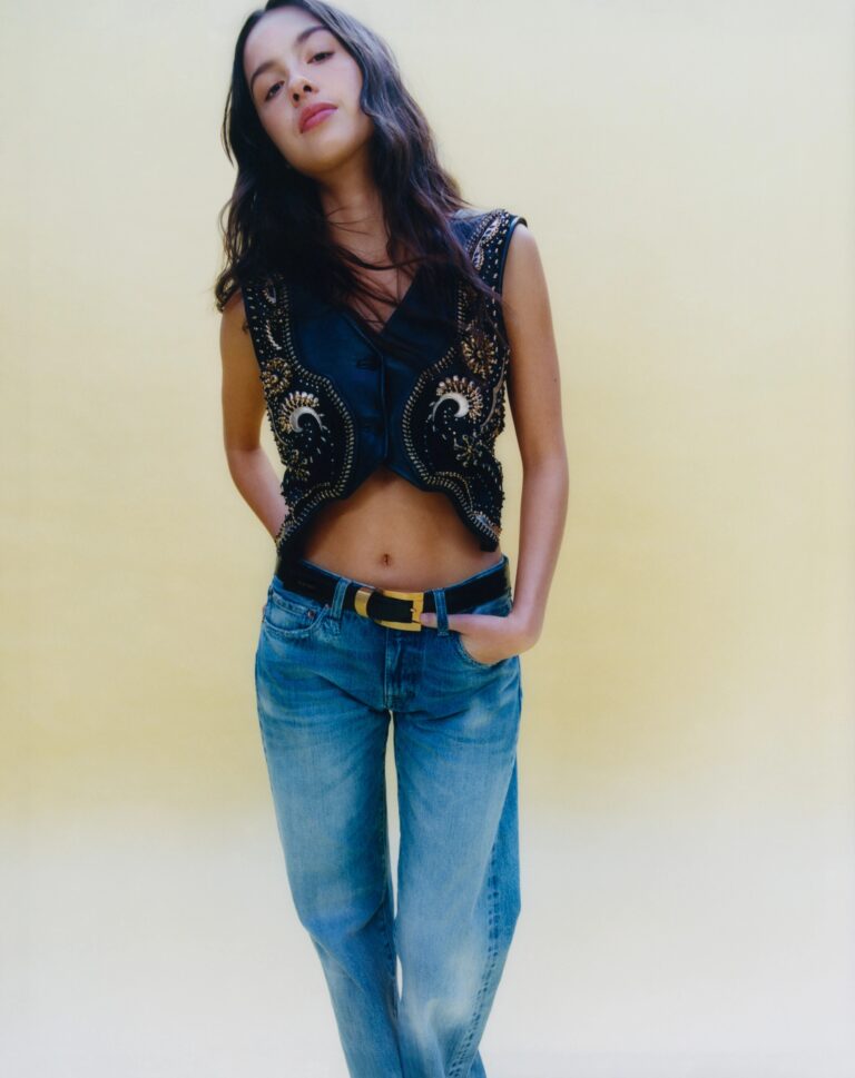 Olivia Rodrigo: Rocks a black vest with gold and silver embroidery, paired with denim…