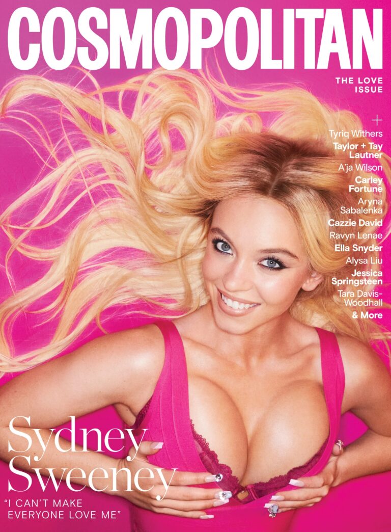 Sydney Sweeney: Loose blonde hair with waves, wearing a fitted pink top, showing an expression…
