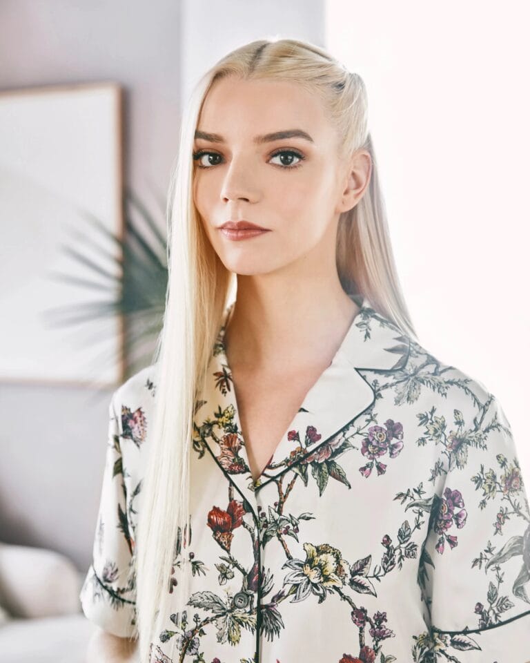 Anya Taylor-Joy: Wears a silk blouse with a floral print in soft tones, with a cut…