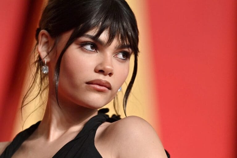 Ariana Greenblatt: Wears a black dress with delicate straps that highlights her elegance and sophistication. Complements…