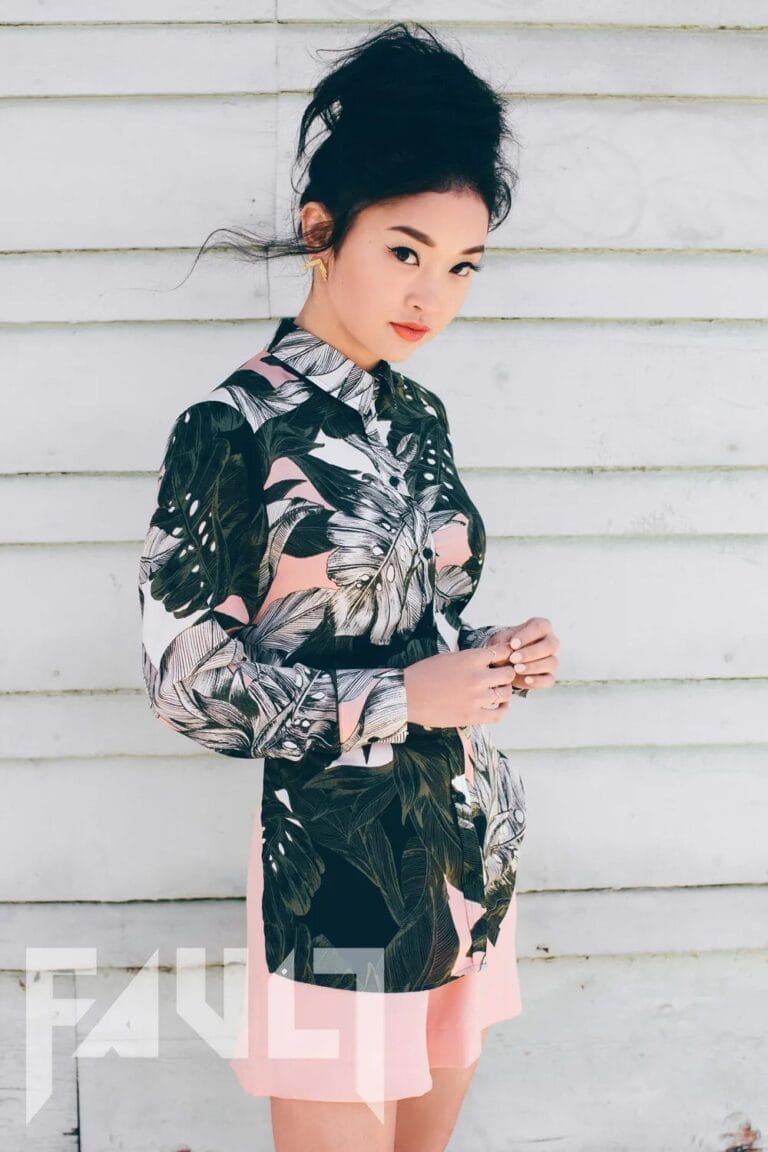 Lana Condor: Wears a long-sleeve blouse with a leaf print in shades of green and…