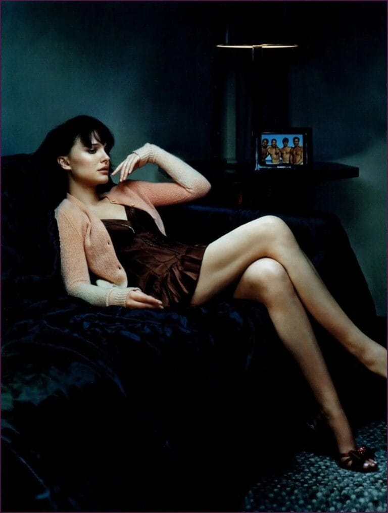 Natalie Portman: Wearing a fitted brown dress with a short skirt and a knit cardigan…