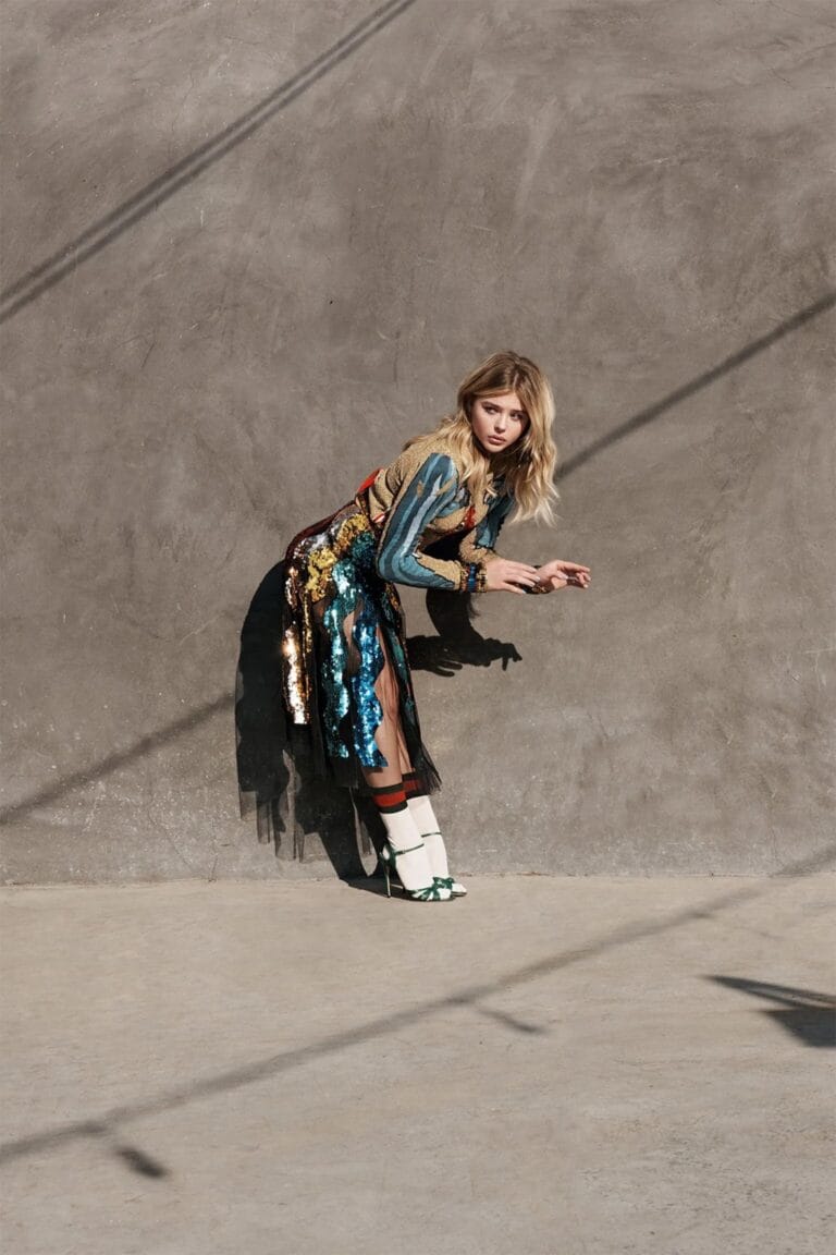 Chloë Grace Moretz: Wears a sparkly dress with a tulle skirt, striking a…