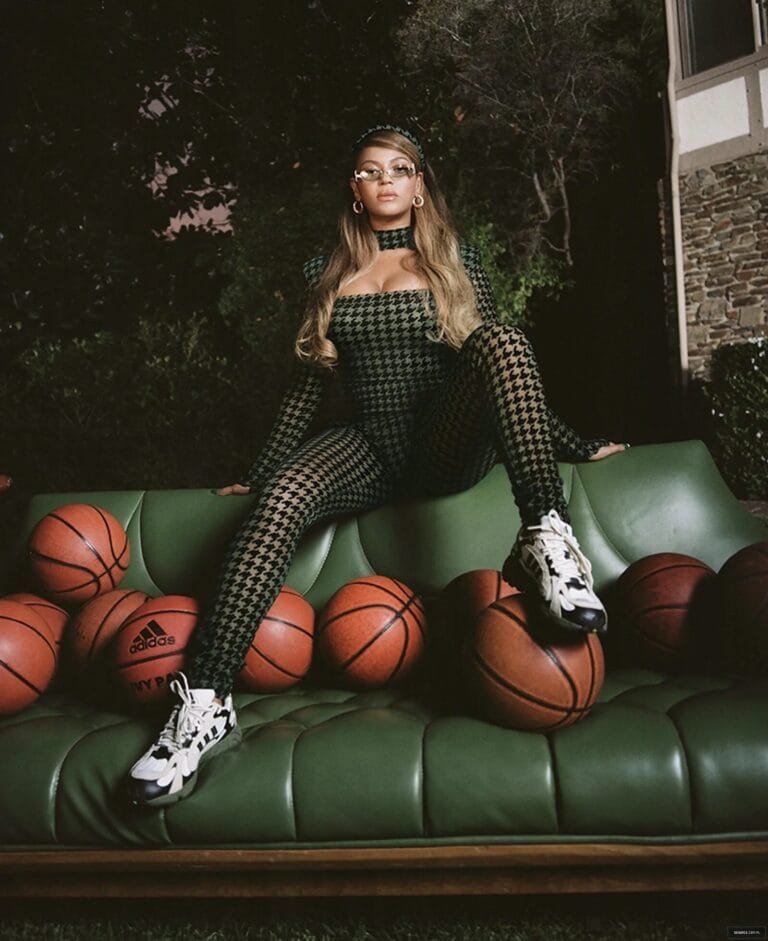 Beyoncé: Poses on a Green Sofa in a Houndstooth Bodysuit…