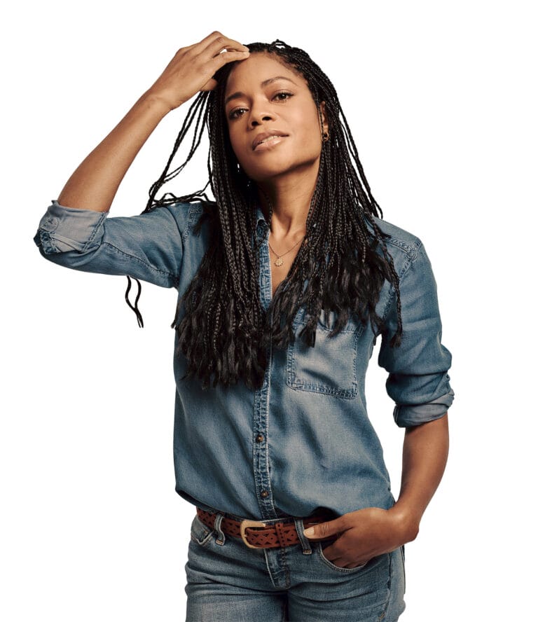 Naomie Harris: Wears a long-sleeved denim shirt, slightly unbuttoned, that highlights her style…
