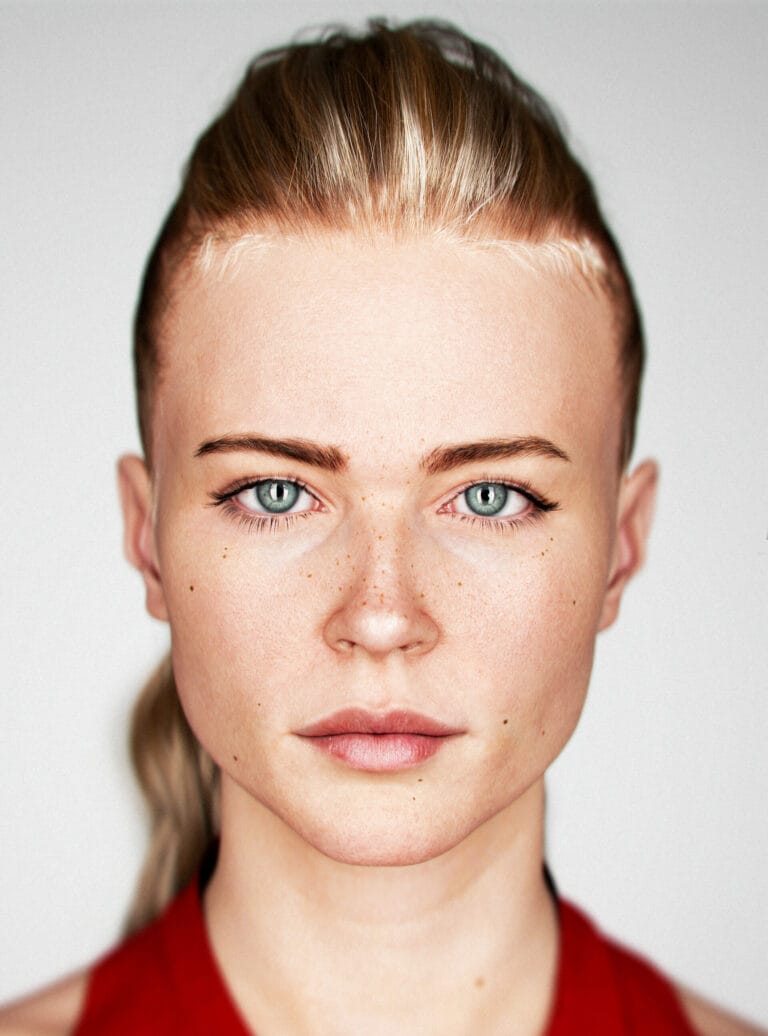 Jeanne Goursaud: Wears a red top that highlights her fresh, fair skin, with a hairstyle…