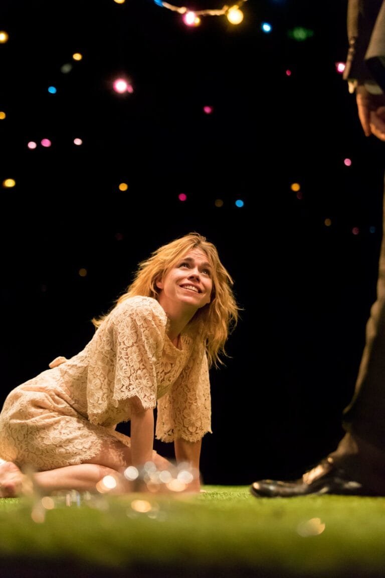 Billie Piper: Appears kneeling on an artificial grass background, wearing a lace dress…