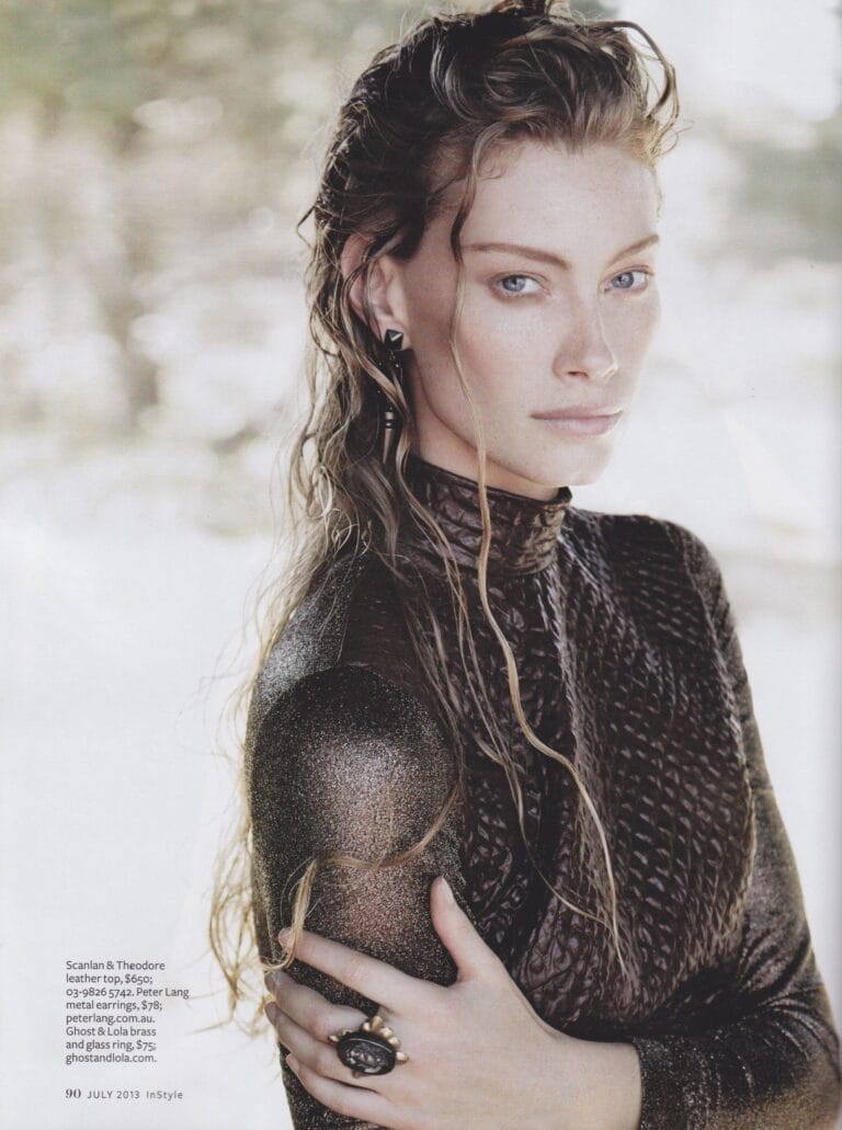 Alyssa Sutherland: Wears a black leather blouse with a textured design that clings to the…