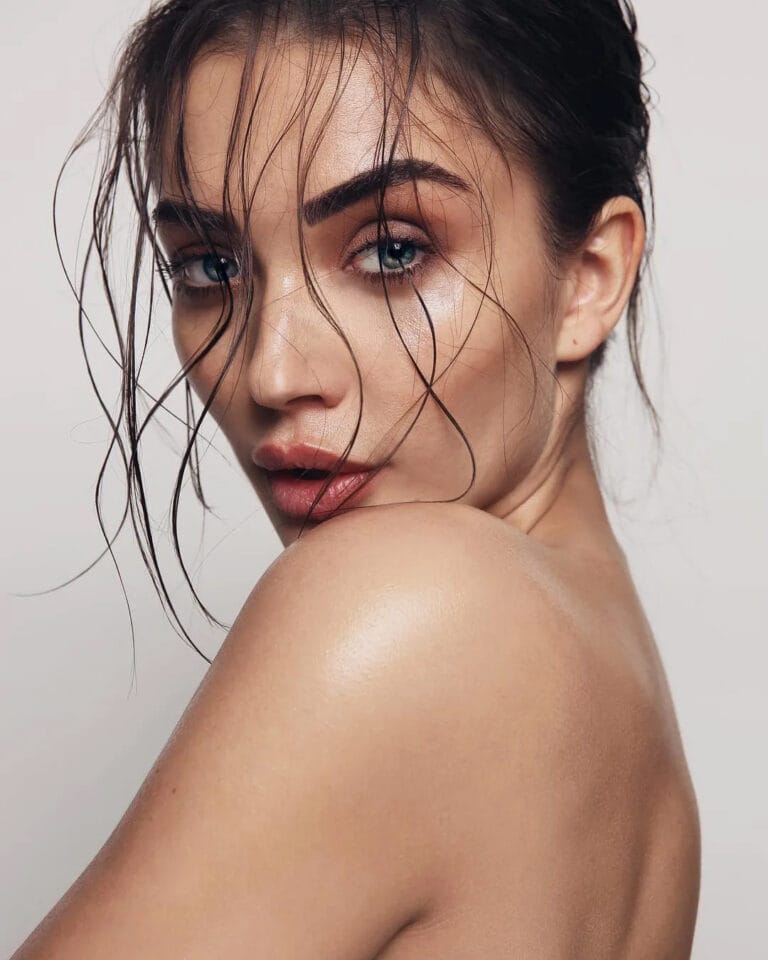 Amy Jackson: Shows a captivating expression with damp, loose hair framing her face…