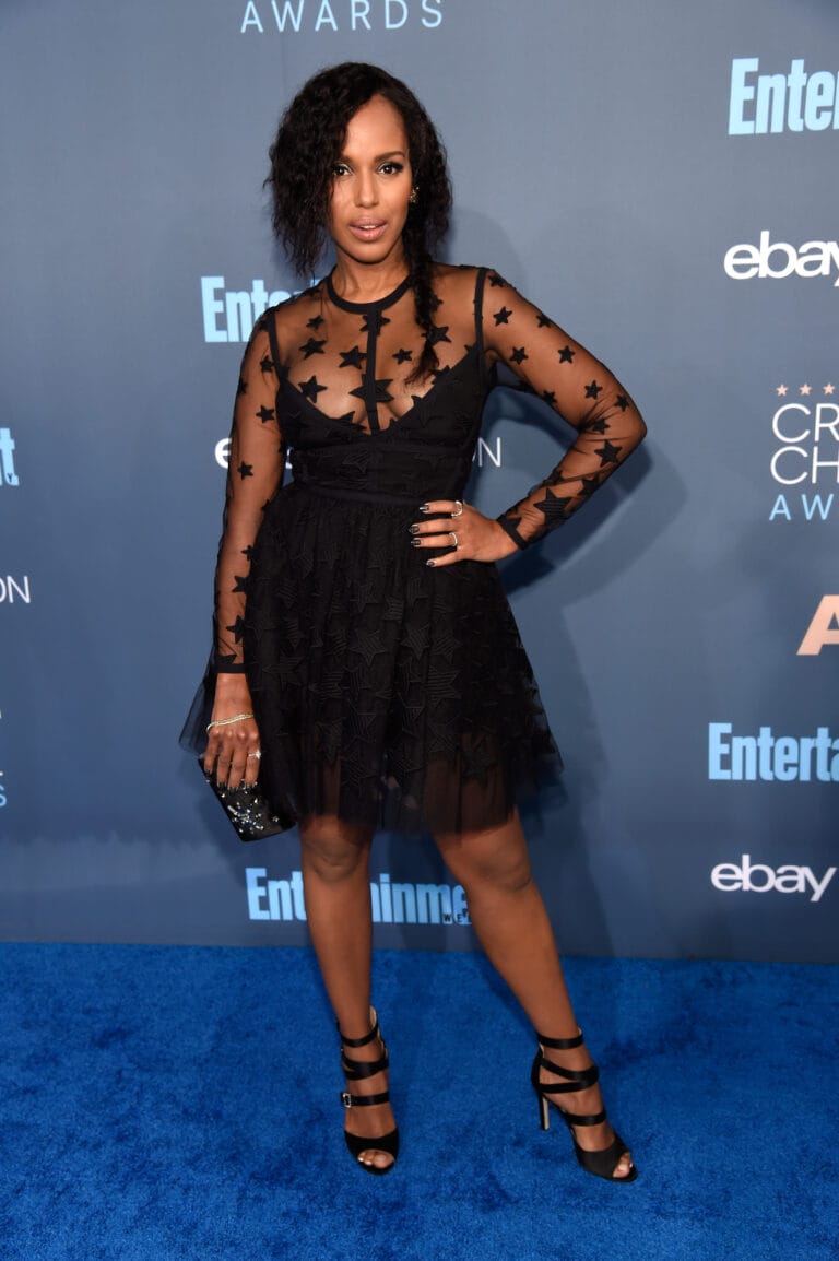 Kerry Washington: Poses in a black sheer tulle dress adorned with stars, revealing…