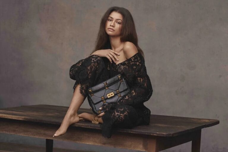 Zendaya: Wears a black lace set that glides smoothly over her skin, with…